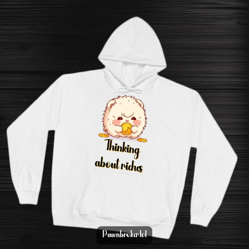 Funny hoodie featuring a fluffy creature mesmerized by a golden coin, radiating warmth and humorous curiosity.